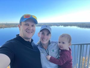 Katherine Perry-Hamski with husband and caddie Kevin and son John.